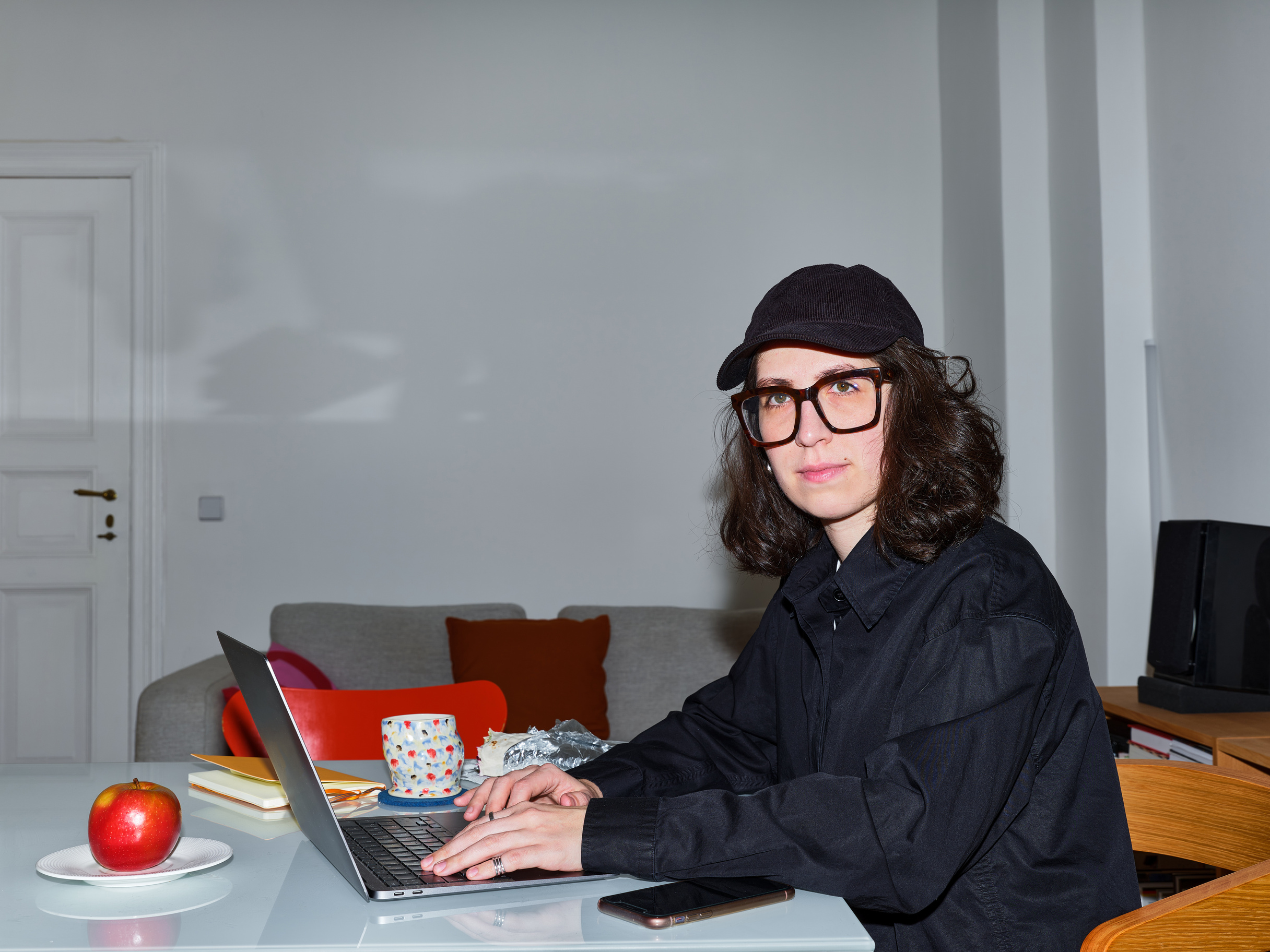 Pensive Woman Working on a Laptop