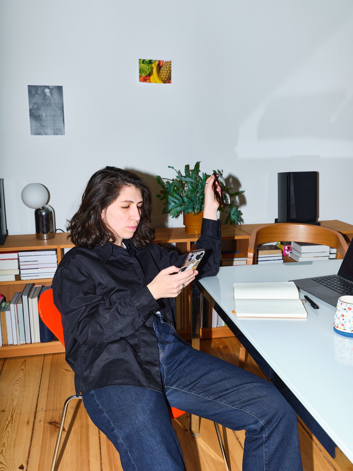 Woman Using Smartphone While Working at Home Office